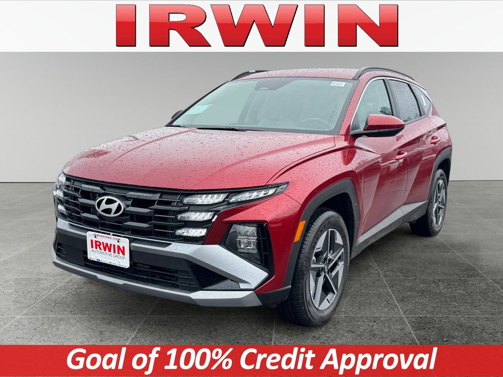 2026 Hyundai TUCSON HYBRID SEL AWD in Red — front three-quarter view